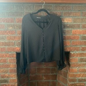 Black textured button up blouse with mesh back and sleeves